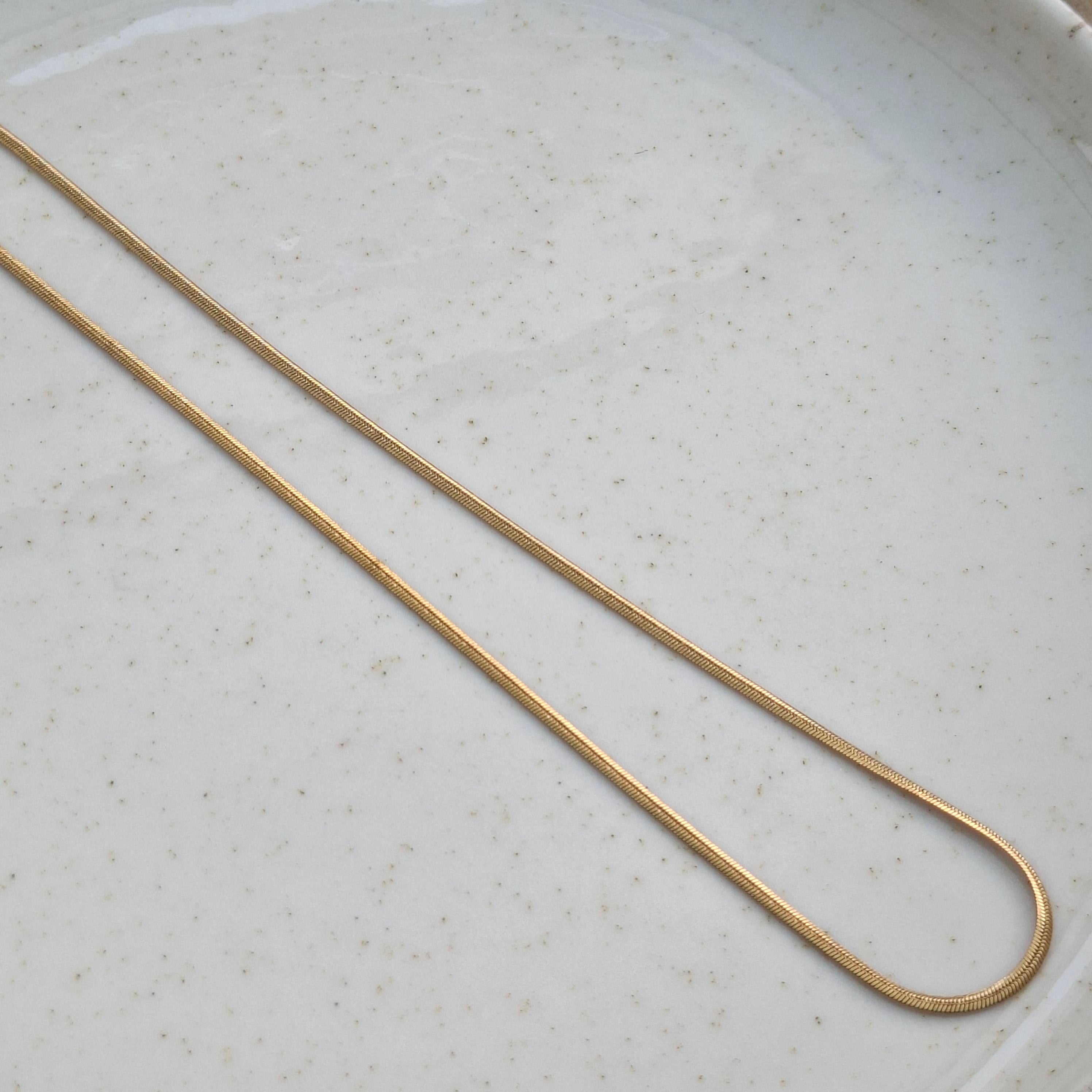 CADENA PEITO BAÑADO EN ORO