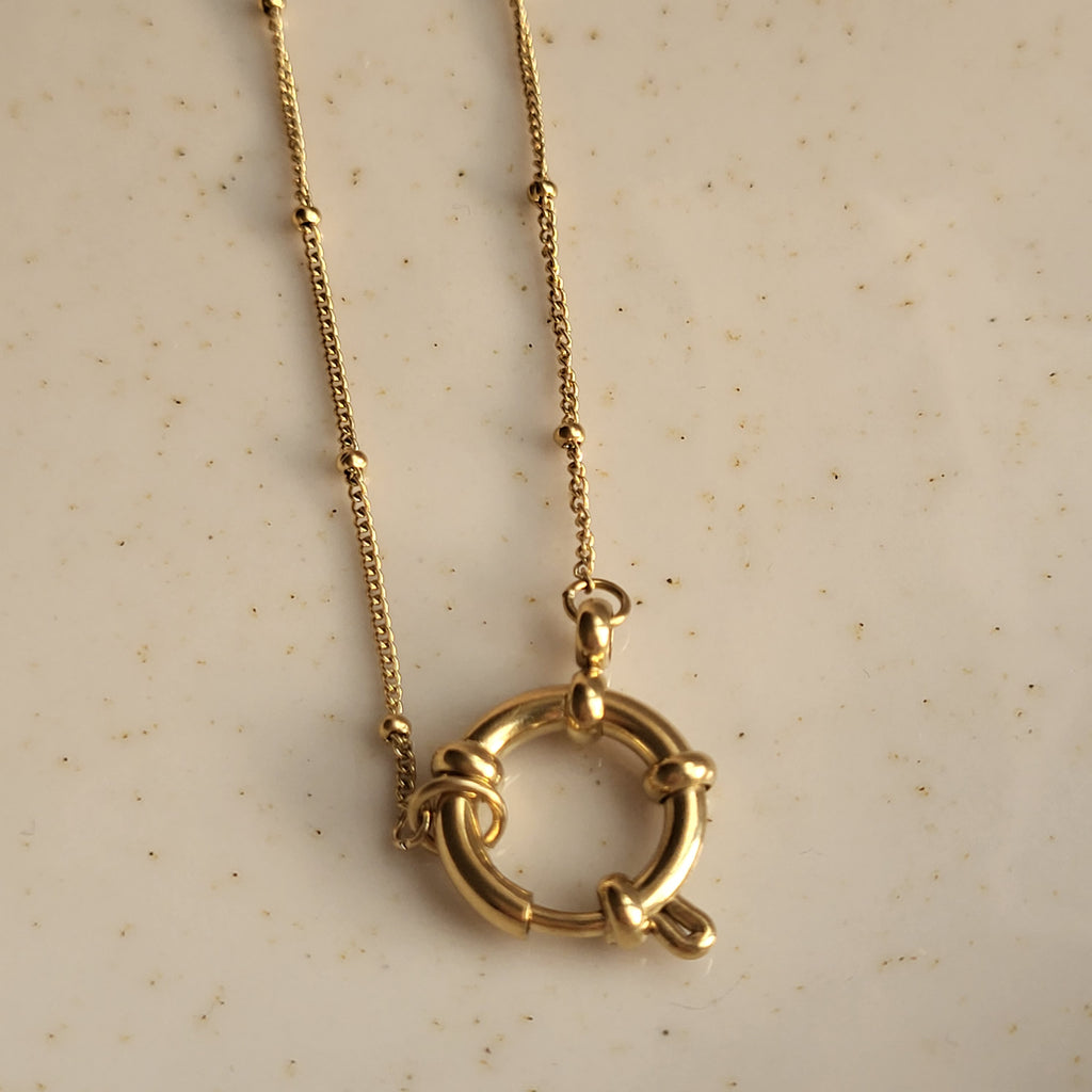 COLGANTE ANFITRITE BAÑADO EN ORO