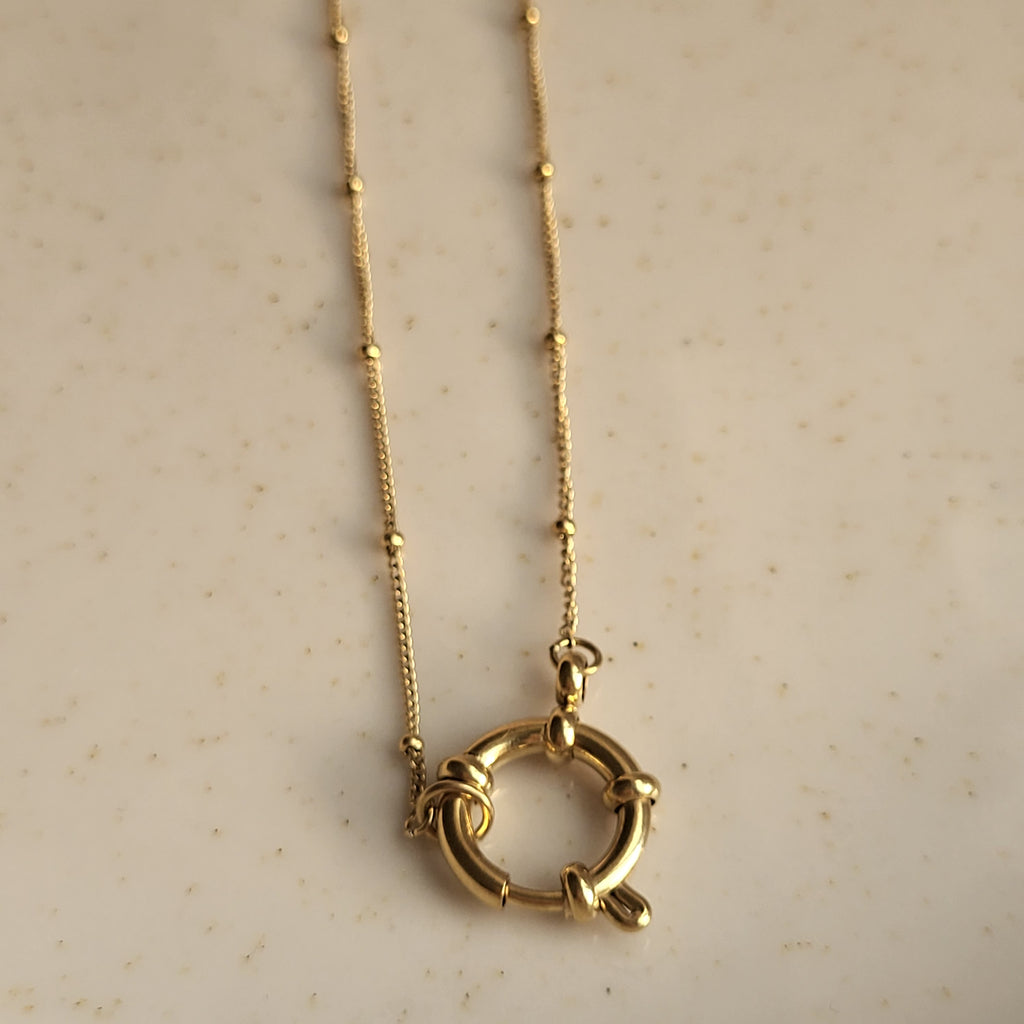 COLGANTE ANFITRITE BAÑADO EN ORO
